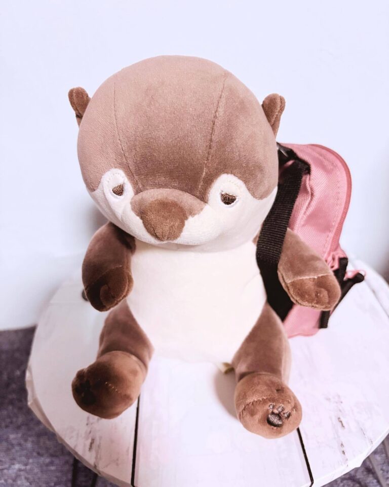 Otter with Backpack Charm